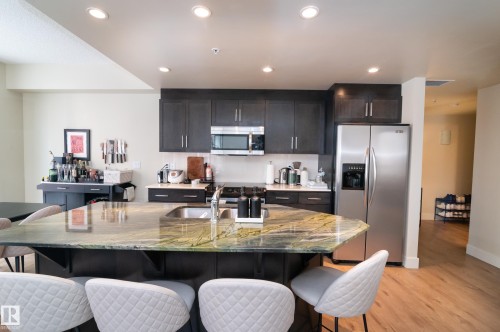 304 11933 Jasper Avenue, Edmonton, AB - Indoor Photo Showing Kitchen With Double Sink With Upgraded Kitchen