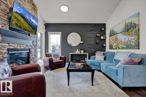 1404 Latta Court, Edmonton, AB - Indoor Photo Showing Living Room With Fireplace
