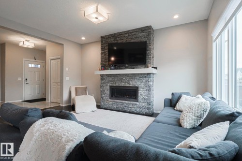 17135 47 Street, Edmonton, AB - Indoor Photo Showing Living Room With Fireplace