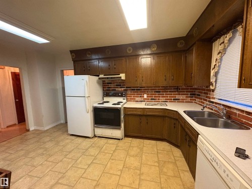 12245 77 Street, Edmonton, AB - Indoor Photo Showing Kitchen With Double Sink