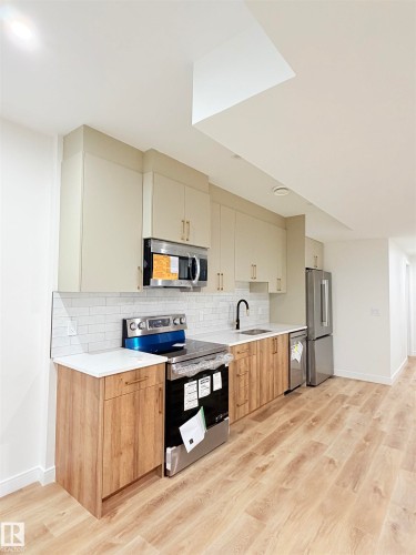 7942 89 Avenue, Edmonton, AB - Indoor Photo Showing Kitchen With Upgraded Kitchen