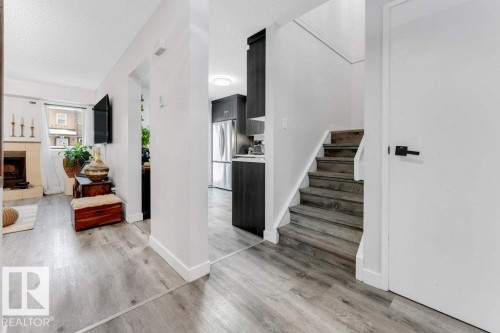 18010 96 Ave, Edmonton, AB - Indoor Photo Showing Other Room With Fireplace