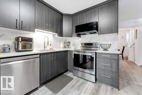 18010 96 Ave, Edmonton, AB - Indoor Photo Showing Kitchen With Stainless Steel Kitchen With Upgraded Kitchen