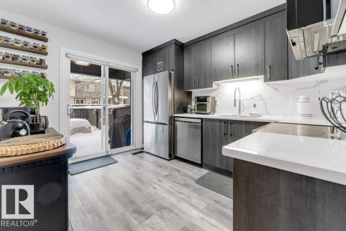 18010 96 Ave, Edmonton, AB - Indoor Photo Showing Kitchen With Stainless Steel Kitchen With Upgraded Kitchen