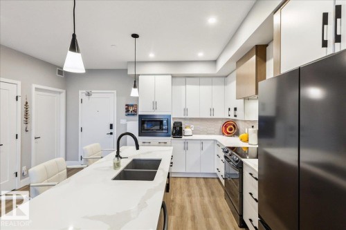 527 7463 May Common, Edmonton, AB - Indoor Photo Showing Kitchen With Double Sink With Upgraded Kitchen