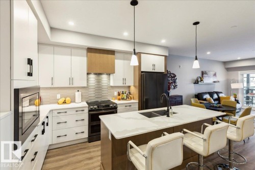 527 7463 May Common, Edmonton, AB - Indoor Photo Showing Kitchen With Double Sink With Upgraded Kitchen