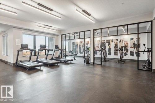 527 7463 May Common, Edmonton, AB - Indoor Photo Showing Gym Room