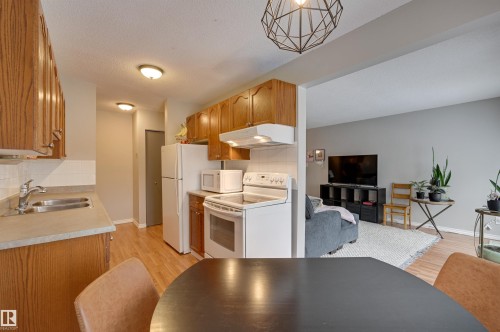 302 10230 114 Street, Edmonton, AB - Indoor Photo Showing Kitchen With Double Sink