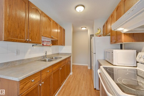 302 10230 114 Street, Edmonton, AB - Indoor Photo Showing Kitchen With Double Sink