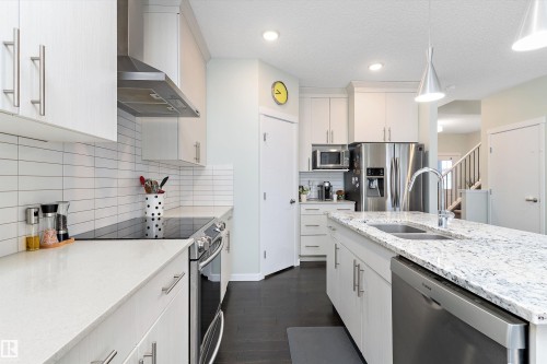 2927 11 Street, Edmonton, AB - Indoor Photo Showing Kitchen With Stainless Steel Kitchen With Double Sink With Upgraded Kitchen