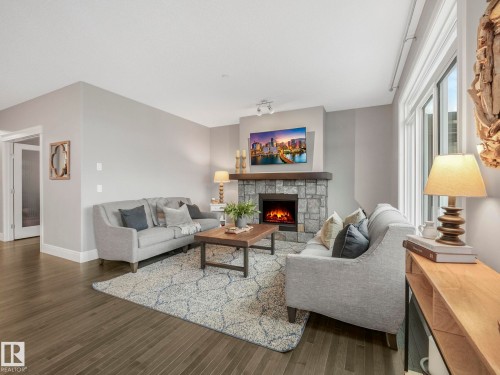 1785 Westerra Loop, Stony Plain, AB - Indoor Photo Showing Living Room With Fireplace