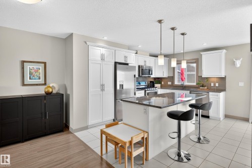 6 1150 Winderemere Way, Edmonton, AB - Indoor Photo Showing Kitchen With Stainless Steel Kitchen With Upgraded Kitchen