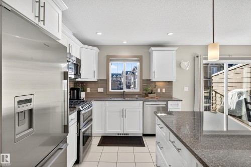 6 1150 Winderemere Way, Edmonton, AB - Indoor Photo Showing Kitchen With Stainless Steel Kitchen With Upgraded Kitchen