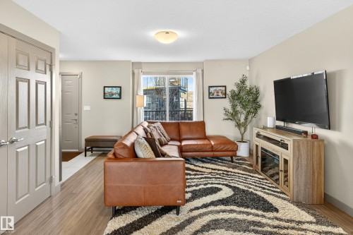6 1150 Winderemere Way, Edmonton, AB - Indoor Photo Showing Living Room
