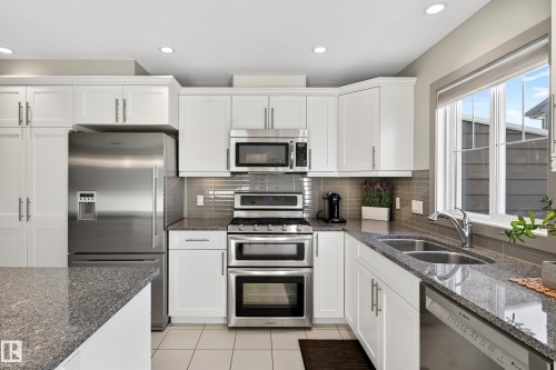 6 1150 Winderemere Way, Edmonton, AB - Indoor Photo Showing Kitchen With Stainless Steel Kitchen With Double Sink With Upgraded Kitchen