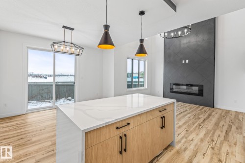 10 Enns Court, Fort Saskatchewan, AB - Indoor Photo Showing Other Room With Fireplace