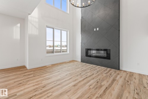 10 Enns Court, Fort Saskatchewan, AB - Indoor Photo Showing Living Room With Fireplace