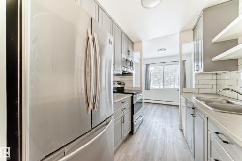 204 11420 40 Avenue, Edmonton, AB - Indoor Photo Showing Kitchen With Stainless Steel Kitchen With Double Sink With Upgraded Kitchen