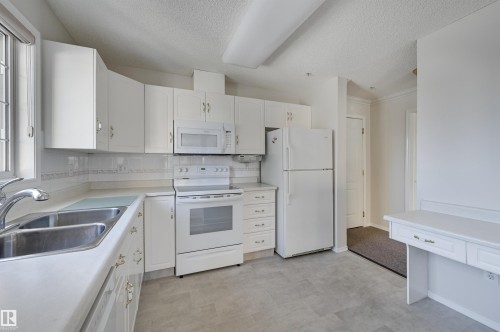 205 13450 114 Avenue, Edmonton, AB - Indoor Photo Showing Kitchen With Double Sink
