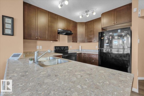 1853 28 Street, Edmonton, AB - Indoor Photo Showing Kitchen With Double Sink