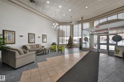 Common area with recessed lighting and a high ceiling - 