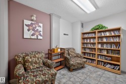 Living area featuring a textured ceiling - 