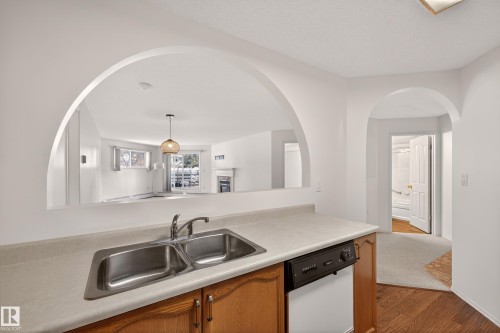 106 15499 Castle Downs Road, Edmonton, AB - Indoor Photo Showing Kitchen With Double Sink
