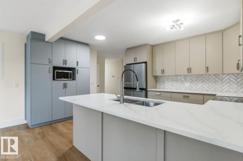 8316 68A Street, Edmonton, AB - Indoor Photo Showing Kitchen With Double Sink