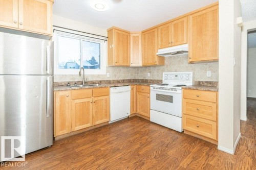 Edmonton, AB - Indoor Photo Showing Kitchen