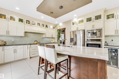 5503 Poirier Way, Beaumont, AB - Indoor Photo Showing Kitchen With Upgraded Kitchen
