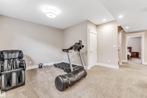 5503 Poirier Way, Beaumont, AB - Indoor Photo Showing Gym Room