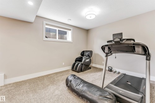 5503 Poirier Way, Beaumont, AB - Indoor Photo Showing Gym Room