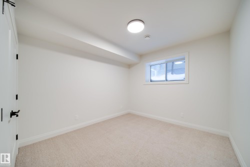 5605 Cautley Cove Cove, Edmonton, AB - Indoor Photo Showing Other Room