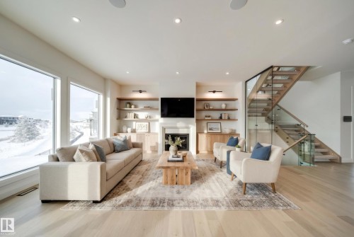5605 Cautley Cove Cove, Edmonton, AB - Indoor Photo Showing Living Room With Fireplace