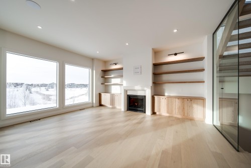 5605 Cautley Cove Cove, Edmonton, AB - Indoor With Fireplace