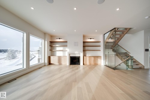 5605 Cautley Cove Cove, Edmonton, AB - Indoor Photo Showing Living Room With Fireplace