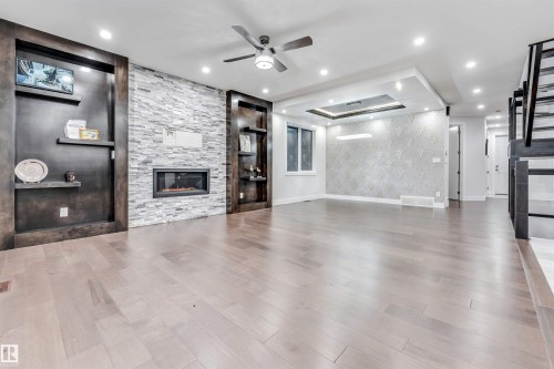 1935 19 Avenue, Edmonton, AB - Indoor Photo Showing Living Room With Fireplace