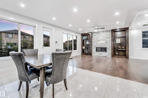 1935 19 Avenue, Edmonton, AB - Indoor Photo Showing Dining Room With Fireplace