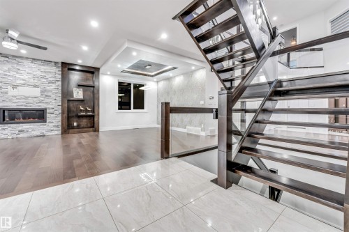 1935 19 Avenue, Edmonton, AB - Indoor Photo Showing Other Room With Fireplace