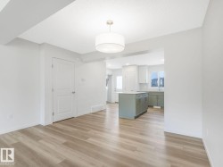 Unfurnished living room with light wood-style flooring - 