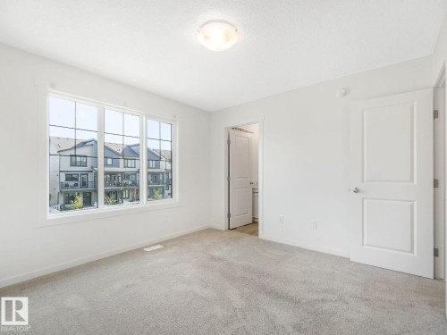 1173 Aster Boulevard Nw, Edmonton, AB - Indoor Photo Showing Other Room