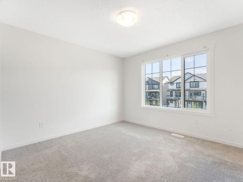 1173 Aster Boulevard Nw, Edmonton, AB - Indoor Photo Showing Other Room