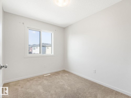 1173 Aster Boulevard Nw, Edmonton, AB - Indoor Photo Showing Other Room
