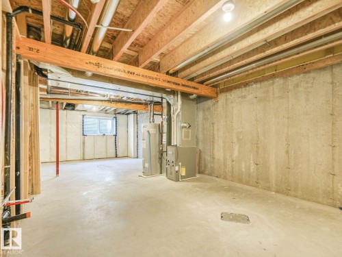 1173 Aster Boulevard Nw, Edmonton, AB - Indoor Photo Showing Basement
