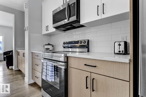 6636 46 Avenue, Beaumont, AB - Indoor Photo Showing Kitchen With Upgraded Kitchen