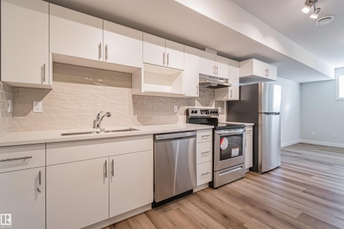 12044 79 Street, Edmonton, AB - Indoor Photo Showing Kitchen With Double Sink