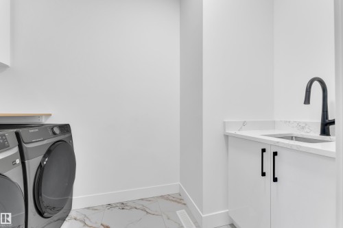 745 Astoria Way, Devon, AB - Indoor Photo Showing Laundry Room