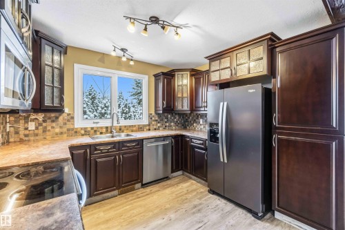 37 Devonian, Devon, AB - Indoor Photo Showing Kitchen With Double Sink