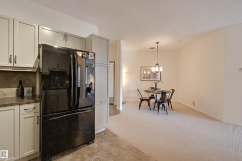 221 6083 Maynard Way, Edmonton, AB - Indoor Photo Showing Other Room