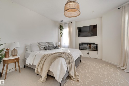 221 6083 Maynard Way, Edmonton, AB - Indoor Photo Showing Bedroom